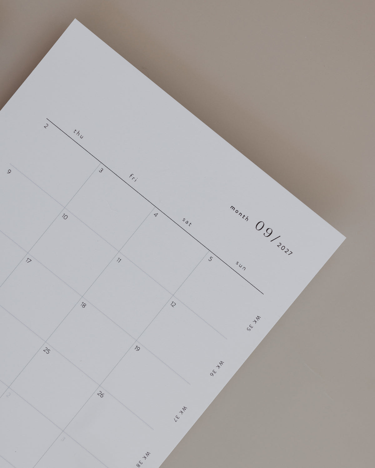 Close-up of a printable month-on-two-pages planner insert.